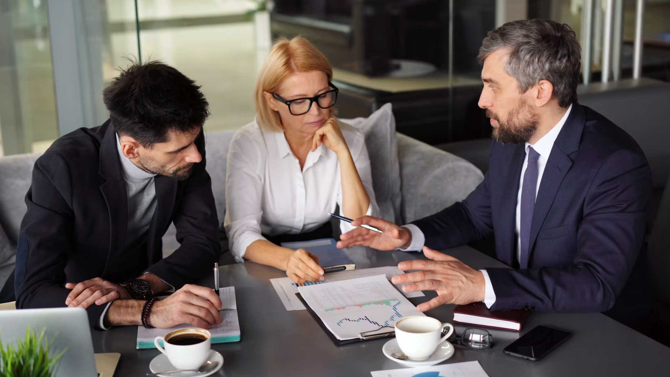 seo freelancer discussing results of website audit with clients